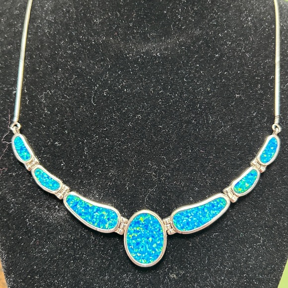 Beautiful lab grown blue opal and sterling silver vintage necklace.